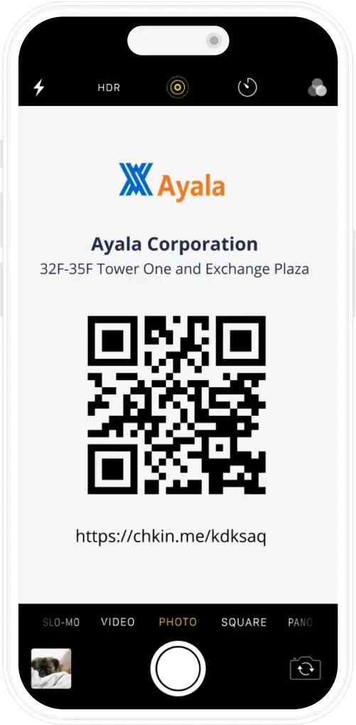 Phone scanning an Ayala Corporation QR check-in code for a Tower One and Exchange Plaza floor