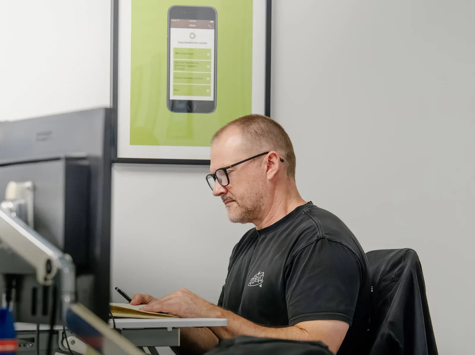 A Putti mobile app developer at work in the Auckland office