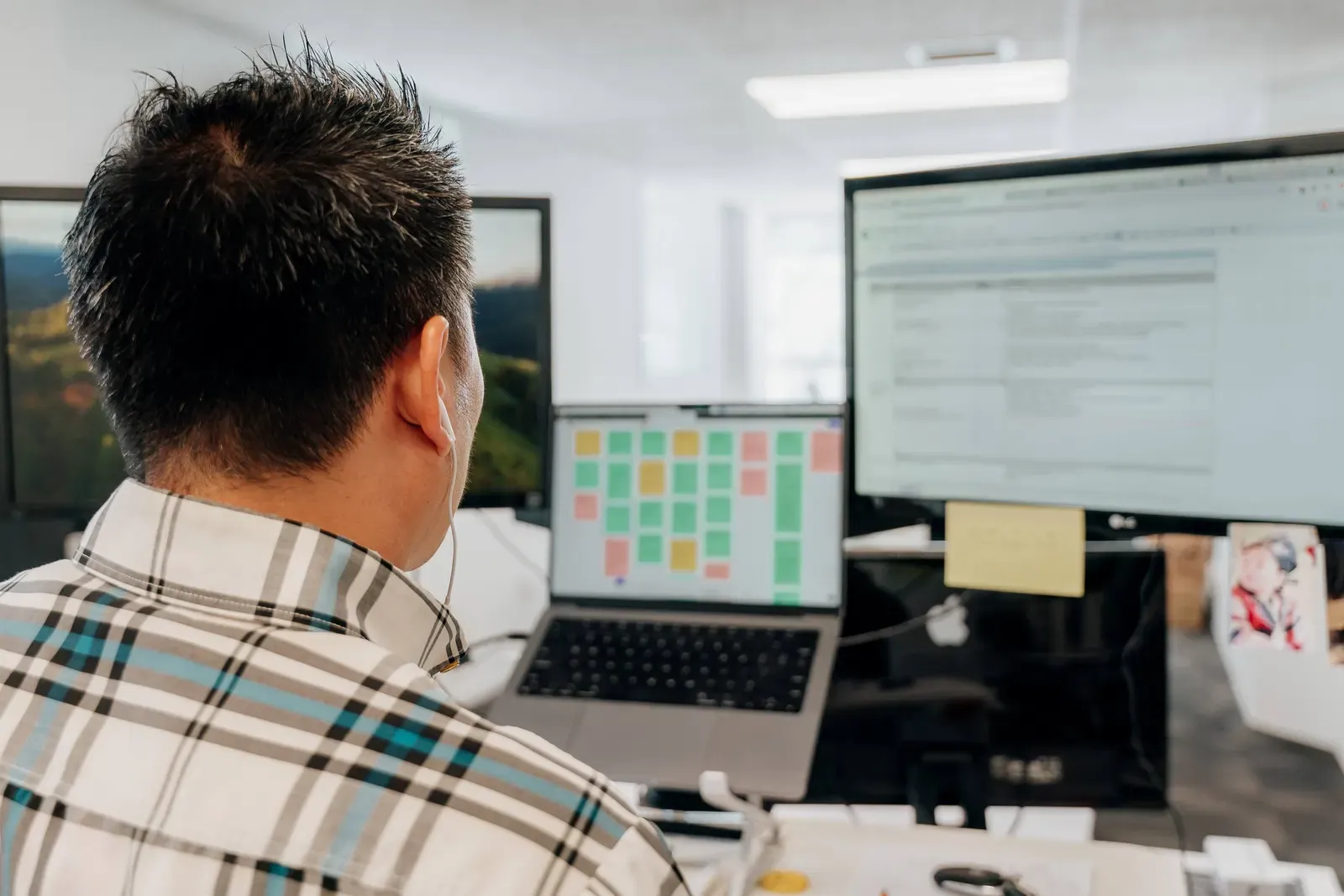 A Putti developer working through a task board and a spreadsheet of workarounds